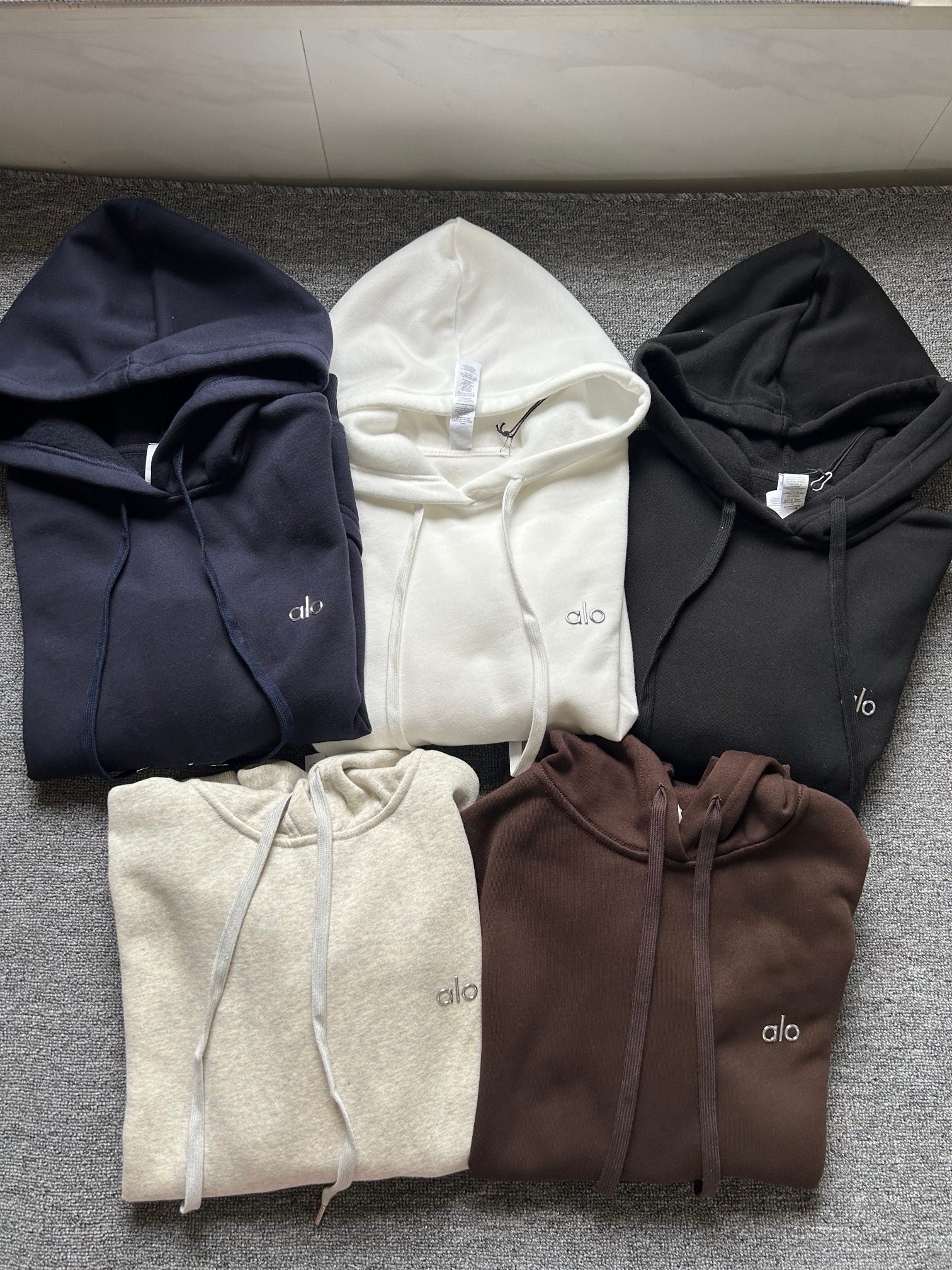 A L O Hoodies